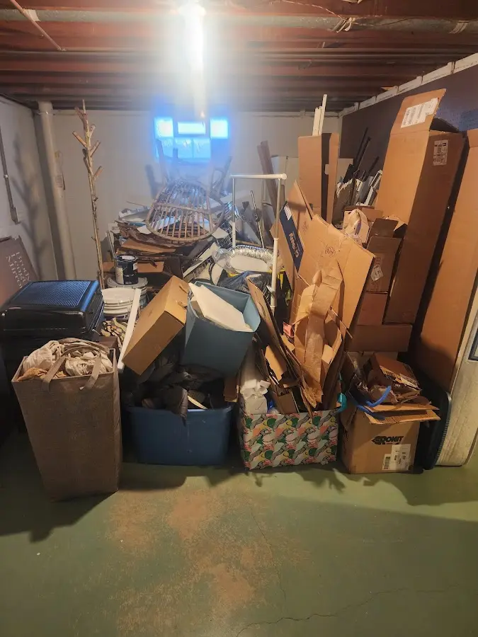 Roll-off dumpster container at job site for 2 Yard Dumpster Rental in Rural Hall